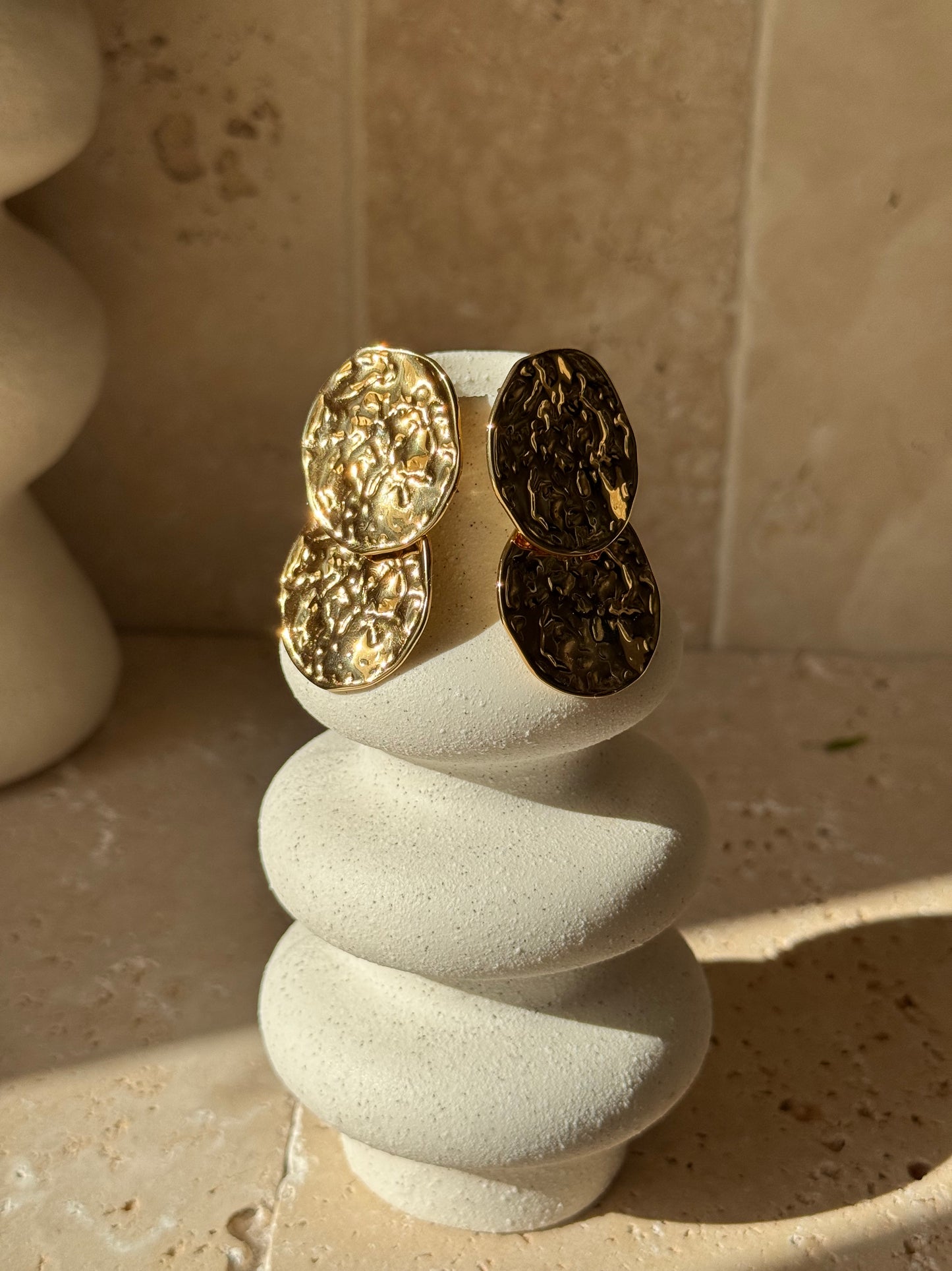 Boucles d'oreilles, SINA