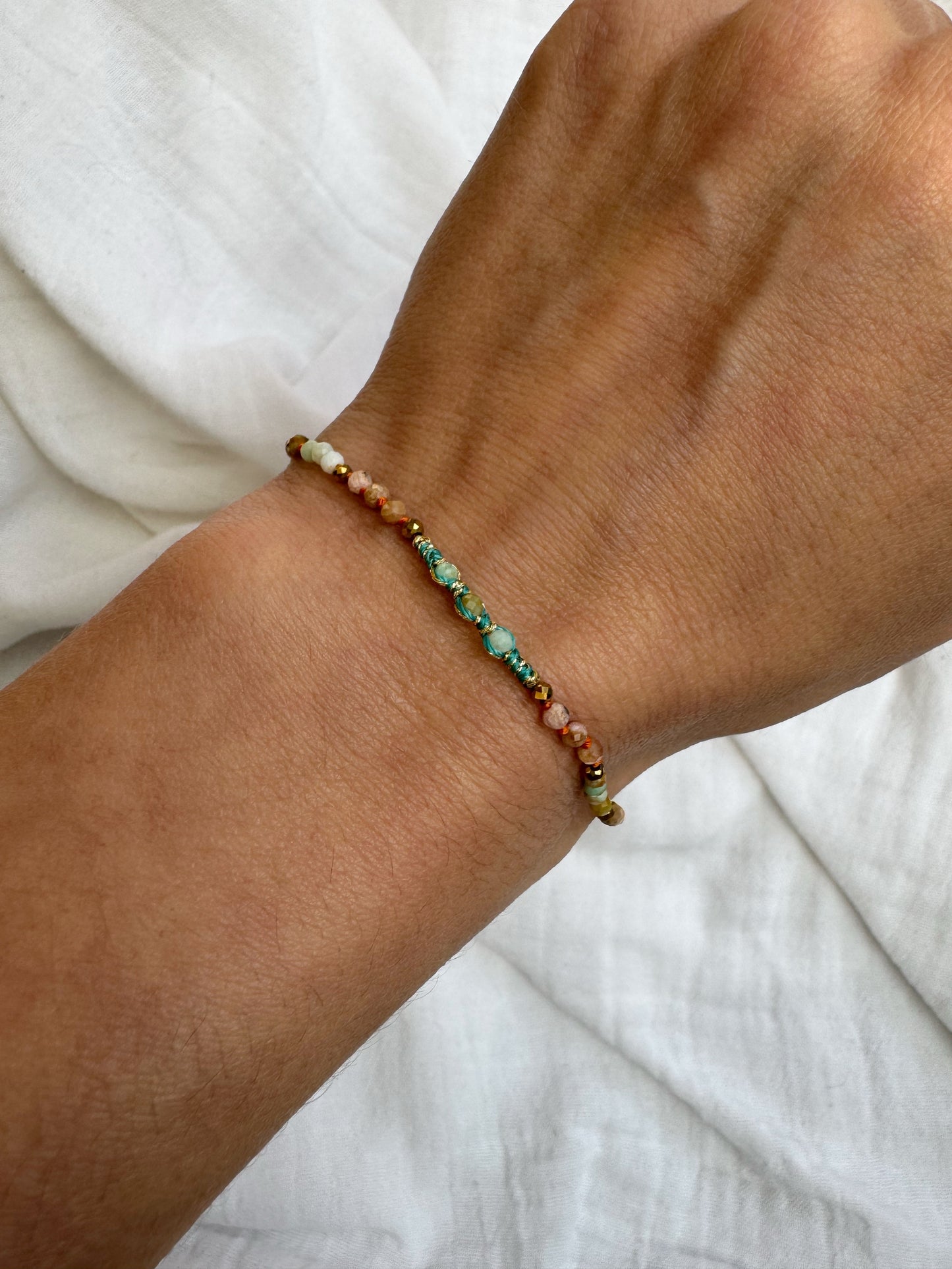 Bracelet orange et bleu, AMI