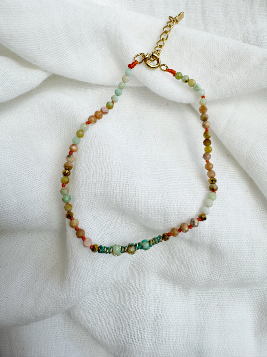 Bracelet orange et bleu, AMI